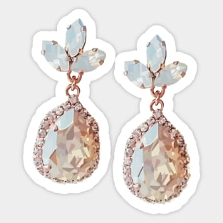 Rose-gold costume jewellery earrings with nude crystals and moon stones. Sticker